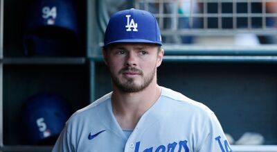 Dodgers' Gavin Lux carted off field after awkwardly injuring knee in spring training game