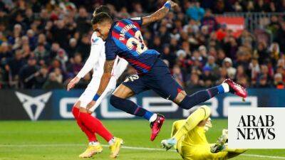 Barcelona exploit Madrid’s stumble to open 8-point lead