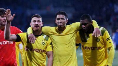 Dortmund battle past Bochum to reach German Cup last eight