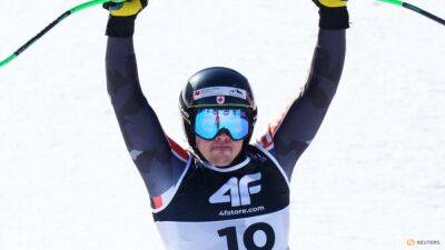 Marco Odermatt - Alpine skiing-Canada's Crawford wins super-G gold by slimmest of margins - channelnewsasia.com - France - Switzerland - Italy - Canada - Norway - Beijing - Austria