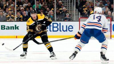Bruins' 10-game winning streak snapped by Oilers