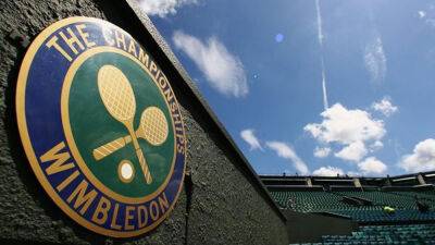 Wimbledon bows to pressure, lifts ban on Russian, Belarusian players