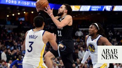 Grizzlies rout Warriors, Bucks hold off Nets