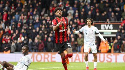 Bournemouth beat limp Reds to boost survival hopes