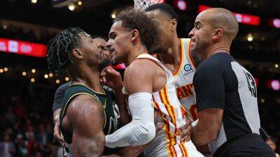 Celtics' Marcus Smart, Hawks' Trae Young get into wrestling match during game, Boston guard ejected