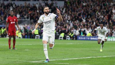 Madrid ease past Liverpool to cruise into quarter-finals