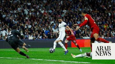 Jurgen Klopp - Carlo Ancelotti - Karim Benzema - Real Madrid defeat Liverpool to reach Champions League quarterfinals - arabnews.com - Manchester - Qatar - Saudi Arabia -  Santiago - Venezuela - Bolivia