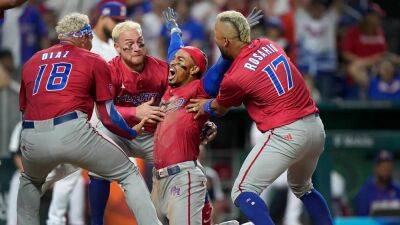 Wilfredo Lee - Francisco Lindor - Julio Rodríguez - Francisco Lindor launches helmet, mobbed by teammates after inside-the-park homer in World Baseball Classic - foxnews.com - Colombia - Usa - Mexico - Canada - county Miami - New York - Venezuela - Puerto Rico - Dominican Republic