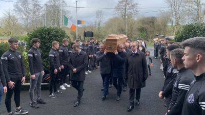 Mourners bid a final farewell to Liam Kearns