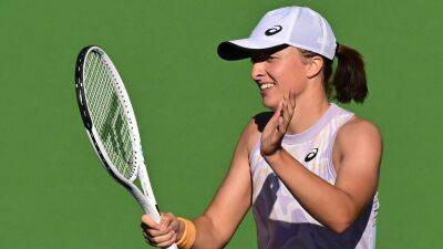 Iga Swiatek keeps Indian Wells title defence on track with victory over Sorana Cirstea to reach semi-finals