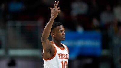 Texas uses long-range shooting to top Colgate in March Madness