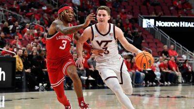Louisville-Virginia Tech men's basketball game turns ugly as dog relieves itself on court during halftime gig - foxnews.com -  Kentucky -  Virginia