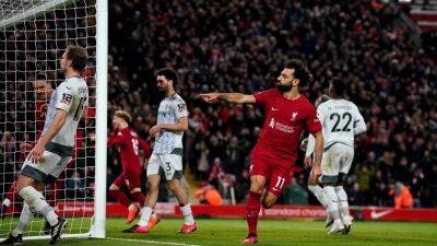 Liverpool see off Wolves to boost European hopes