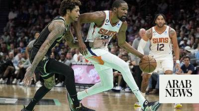 Suns triumph in Durant debut, Tatum powers Celtics past Cavs