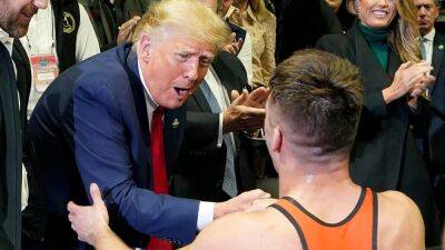 Donald Trump - Trump greets NCAA champion wrestlers, takes pictures with fans during title matches - foxnews.com -  Virginia - state Oklahoma - county Tulsa