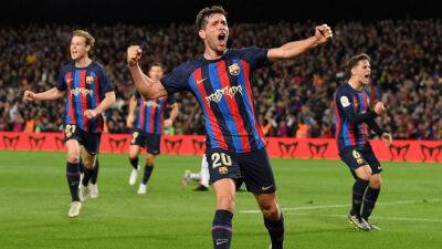 Barca beats Real Madrid in dramatic Clasico to strike title blow