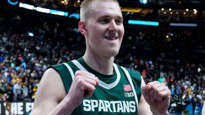Hauser, Michigan State topple Marquette, book trip to New York