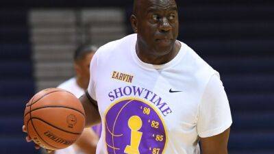 Dan Snyder - Sources: Magic Johnson joins group bidding to buy Commanders - espn.com - Washington - Los Angeles -  Los Angeles - state New Jersey -  Houston - area District Of Columbia -  Phoenix
