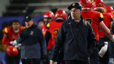 NCAA suspends Ferris State's coach after players lit up cigars during postgame celebration