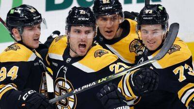 Bruins edge Lightning, secure 'tremendous' division title