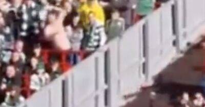 Steven Gerrard - Watch Celtic fan fall short as he throws shirt in response to Liverpool supports' taunts - dailyrecord.co.uk - Scotland
