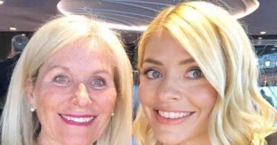 Holly Willoughby stuns fans with mum's age as she's hailed a 'goddess' on trip with rarely seen 'brave' daughter Belle