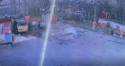 CCTV shows horrifying moment two men are stabbed in broad-daylight at petrol station - manchestereveningnews.co.uk