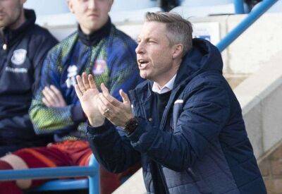 Neil Harris sets his Gillingham side a new points total after climbing clear of relegation trouble in League 2