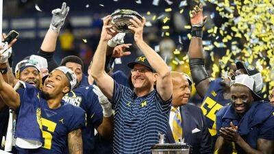Michigan's Jim Harbaugh says NFL interest a 'positive thing'
