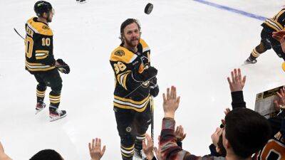 Patrice Bergeron - Brad Marchand - David Pastrnak - Bruins become fastest team to 100 points in NHL history - espn.com -  Boston -  Detroit