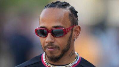 Formula 1’s Lewis Hamilton cleared to race in Bahrain after clashing with FIA over nose stud