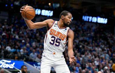 NBA Round up - Durant dazzles as Suns sink Mavs, Curry tastes defeat on return