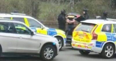 Armed police swoop on car as man arrested over fake gun and making 'threats to kill' - manchestereveningnews.co.uk