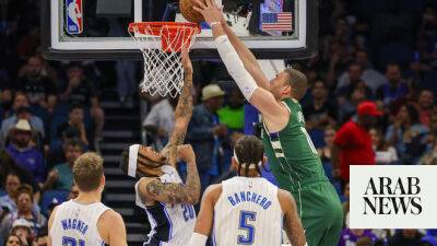 No Giannis, no problem as Bucks top Orlando; Sixers down Wolves