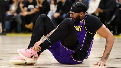 Anthony Davis scores 38, fuels Lakers late after twisting ankle