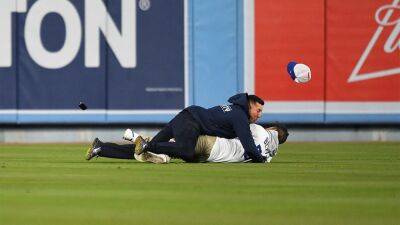 Dodgers fan blasted by security during on-field proposal is engaged: ‘He's a little sore'