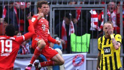 Bayern Munich 4-2 Borussia Dortmund: Bavarians re-claim advantage in title race as Thomas Tuchel begins with win