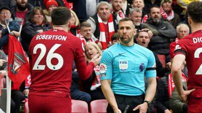Andy Robertson - Andrew Robertson - Premier League assistant referee sidelined after elbowing Liverpool defender in the face, FA investigates - foxnews.com - Britain - Scotland - Florida - county Andrew