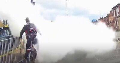 Shocking footage shows moment thug blasts cyclist in the face with fire extinguisher
