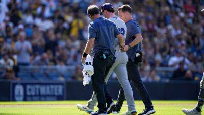 Brewers reliever Varland hit on jaw by Machado liner, helped off field
