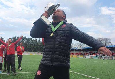 Chatham Town manager-chairman Kevin Hake reacts to his team's Isthmian South East title success