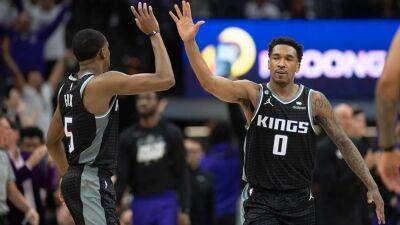 Kings take down defending champion Warriors in first playoff game in 17 years