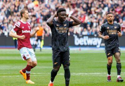 Arsenal blow another 2-0 lead, draw at West Ham as title hopes take a hit