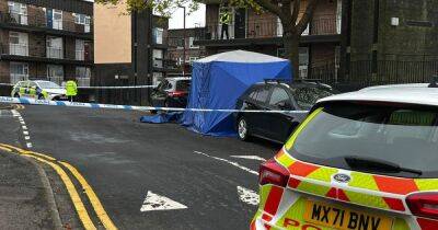 BREAKING: Forensic tent in place outside block of flats with police on scene - latest updates