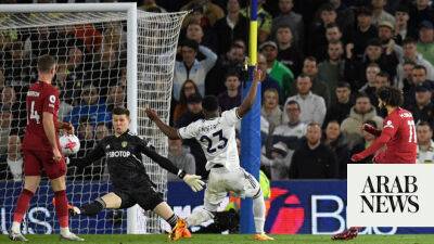 Liverpool hit Leeds for six after controversial Gakpo opener