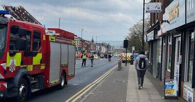 Emergency services swarm street following gas leak with cordon in place