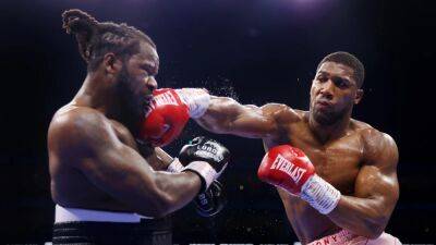 Anthony Joshua labours to win over Jermaine Franklin on ring return