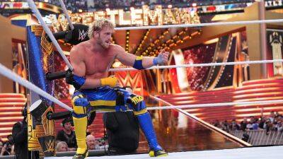Tyson Fury - Logan Paul - Seth Rollins - Logan Paul enters WrestleMania 39 match on zipline, stuns with frog splash - foxnews.com