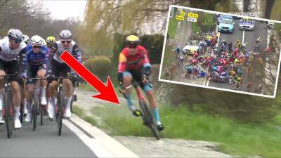 Tour of Flanders crash: 'Awful' - Most of peloton wiped out in horror moment after Filip Maciejuk hits puddle