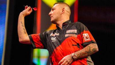 Nathan Aspinall sinks Gerwyn Price to reign in Rotterdam
